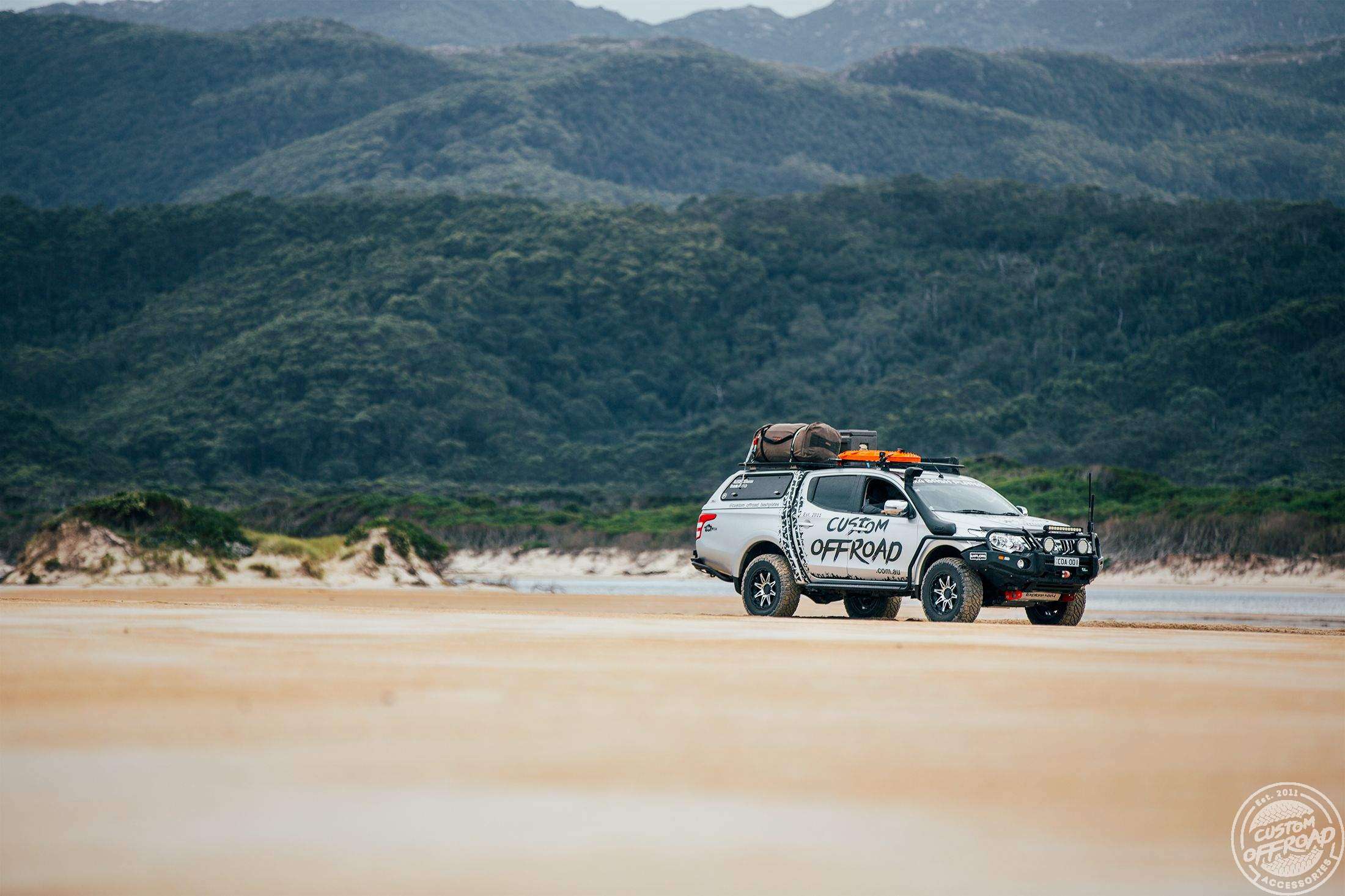 custom offroad vehicle on a beach